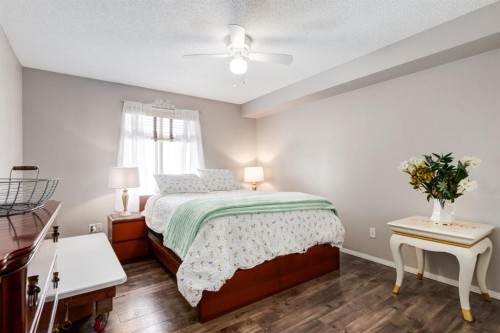 1414-12 Cimarron Common, Okotoks, AB - Indoor Photo Showing Bedroom