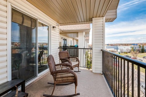 1414-12 Cimarron Common, Okotoks, AB - Outdoor With Balcony With Exterior