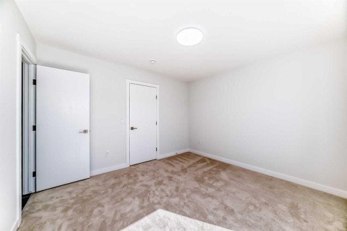21 Cornergate Place Ne, Calgary, AB - Indoor Photo Showing Other Room