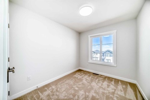 21 Cornergate Place Ne, Calgary, AB - Indoor Photo Showing Other Room