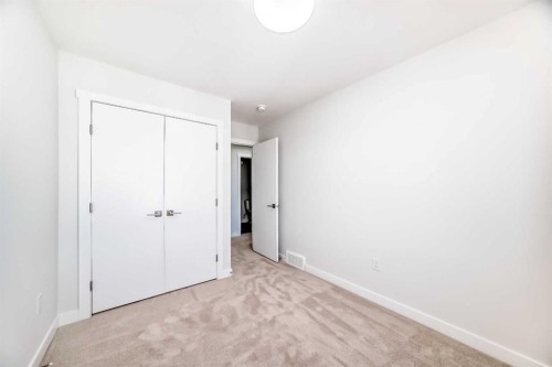 21 Cornergate Place Ne, Calgary, AB - Indoor Photo Showing Other Room