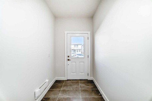 21 Cornergate Place Ne, Calgary, AB - Indoor Photo Showing Other Room