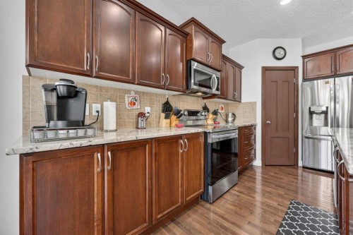 64 Cranridge Crescent Se, Calgary, AB - Indoor Photo Showing Other Room With Fireplace