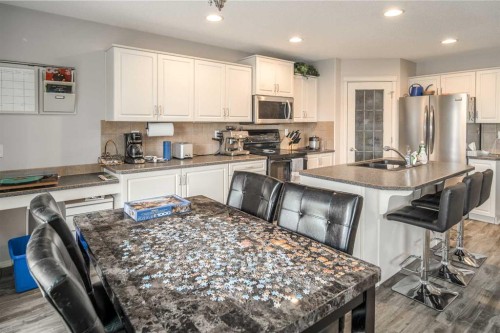 4 Springbank Bay Sw, Calgary, AB - Indoor Photo Showing Kitchen With Stainless Steel Kitchen