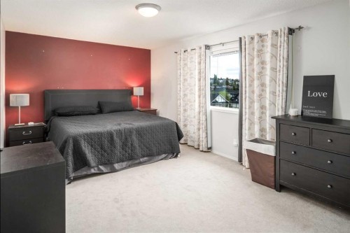 4 Springbank Bay Sw, Calgary, AB - Indoor Photo Showing Bedroom