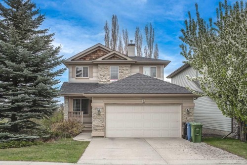 4 Springbank Bay Sw, Calgary, AB - Outdoor With Facade