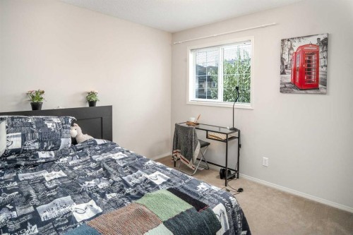 4 Springbank Bay Sw, Calgary, AB - Indoor Photo Showing Bedroom