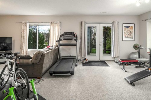 4 Springbank Bay Sw, Calgary, AB - Indoor Photo Showing Gym Room