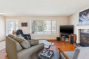 8523 Addison Place Se, Calgary, AB  - Indoor Photo Showing Living Room With Fireplace 