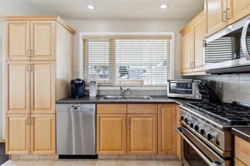 8523 Addison Place Se, Calgary, AB - Indoor Photo Showing Kitchen With Stainless Steel Kitchen With Double Sink