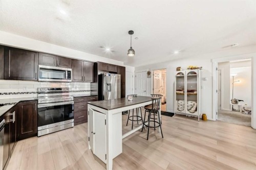 1312-755 Copperpond Boulevard Se, Calgary, AB - Indoor Photo Showing Kitchen With Upgraded Kitchen