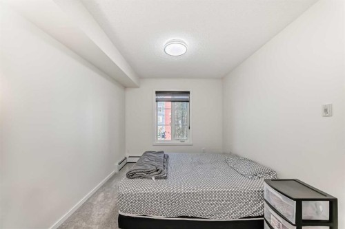1312-755 Copperpond Boulevard Se, Calgary, AB - Indoor Photo Showing Bedroom