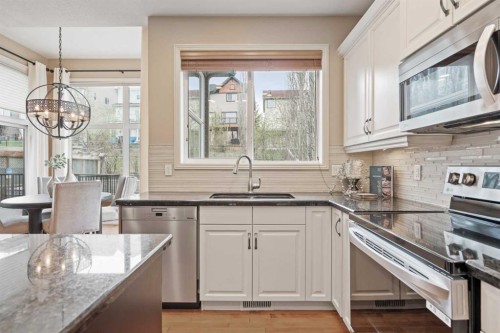 134 Panamount Rise Nw, Calgary, AB - Indoor Photo Showing Kitchen With Double Sink With Upgraded Kitchen