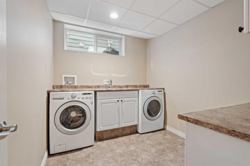 134 Panamount Rise Nw, Calgary, AB - Indoor Photo Showing Laundry Room