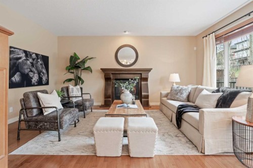 134 Panamount Rise Nw, Calgary, AB - Indoor Photo Showing Living Room With Fireplace