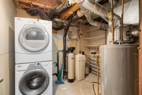 252 Prestwick Heights Se, Calgary, AB - Indoor Photo Showing Laundry Room