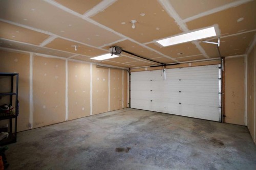 252 Prestwick Heights Se, Calgary, AB - Indoor Photo Showing Garage