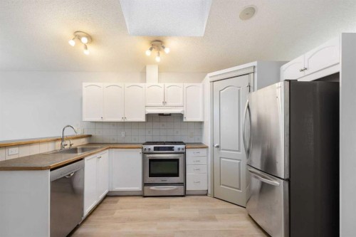 252 Prestwick Heights Se, Calgary, AB - Indoor Photo Showing Kitchen With Stainless Steel Kitchen