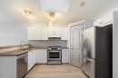 252 Prestwick Heights Se, Calgary, AB  - Indoor Photo Showing Kitchen With Stainless Steel Kitchen 