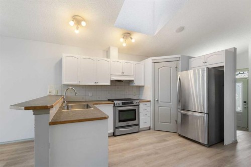 252 Prestwick Heights Se, Calgary, AB - Indoor Photo Showing Kitchen With Stainless Steel Kitchen