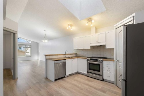 252 Prestwick Heights Se, Calgary, AB - Indoor Photo Showing Kitchen With Stainless Steel Kitchen