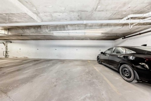2-132 Rockyledge View Nw, Calgary, AB - Indoor Photo Showing Garage
