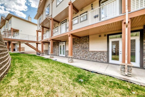 2-132 Rockyledge View Nw, Calgary, AB - Outdoor With Deck Patio Veranda