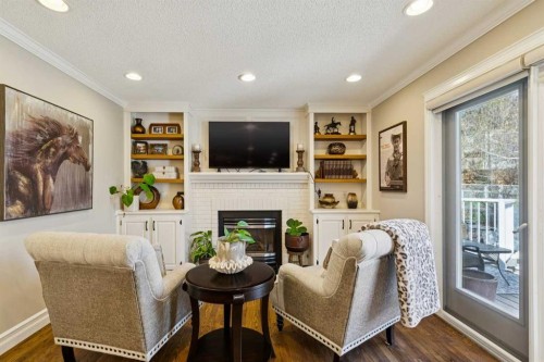 256 Sirocco Place Sw, Calgary, AB - Indoor With Fireplace