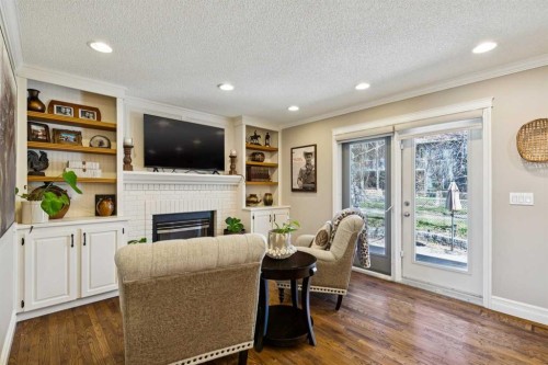 256 Sirocco Place Sw, Calgary, AB - Indoor With Fireplace