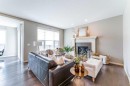 292 Auburn Bay Drive Se, Calgary, AB  - Indoor Photo Showing Living Room With Fireplace 