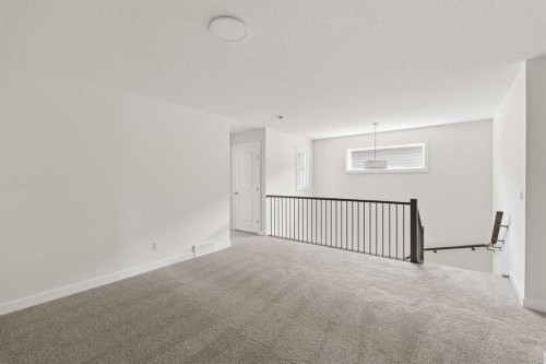 120 Creekstone Circle Sw, Calgary, AB - Indoor Photo Showing Other Room