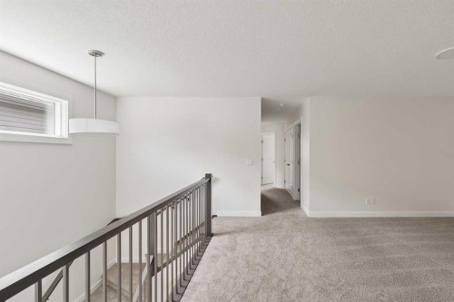 120 Creekstone Circle Sw, Calgary, AB - Indoor Photo Showing Other Room