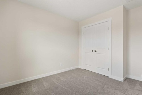 120 Creekstone Circle Sw, Calgary, AB - Indoor Photo Showing Other Room