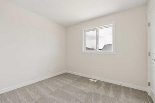 120 Creekstone Circle Sw, Calgary, AB - Indoor Photo Showing Other Room