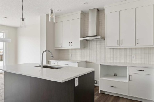 120 Creekstone Circle Sw, Calgary, AB - Indoor Photo Showing Kitchen With Upgraded Kitchen