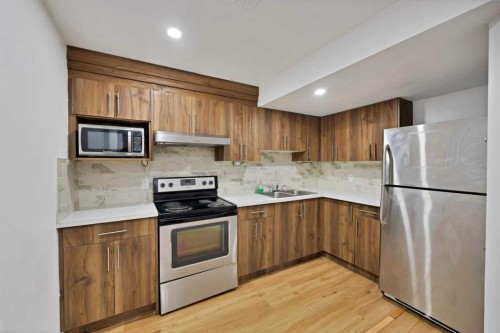 67 Copperstone Circle Se, Calgary, AB - Indoor Photo Showing Kitchen With Stainless Steel Kitchen With Double Sink