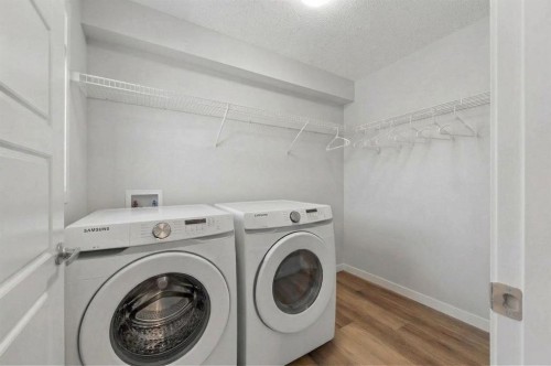 220 Harvest Grove Walk Ne, Calgary, AB - Indoor Photo Showing Laundry Room