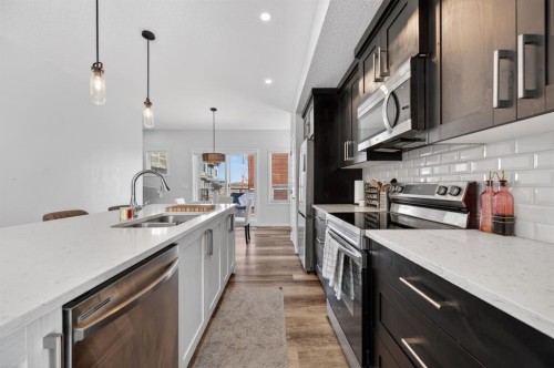 220 Harvest Grove Walk Ne, Calgary, AB - Indoor Photo Showing Kitchen With Double Sink With Upgraded Kitchen