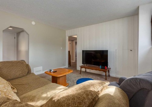 10012 Oakfield Drive Sw, Calgary, AB - Indoor Photo Showing Living Room