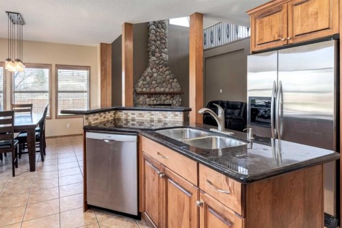 15 Barber Street Nw, Langdon, AB - Indoor Photo Showing Kitchen With Double Sink