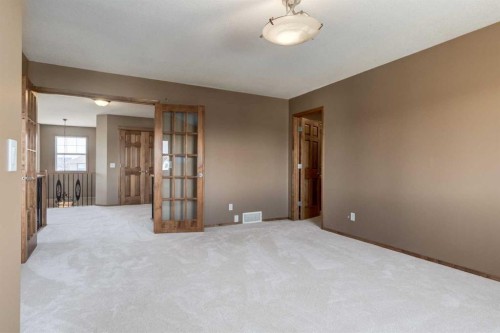 15 Barber Street Nw, Langdon, AB - Indoor Photo Showing Other Room