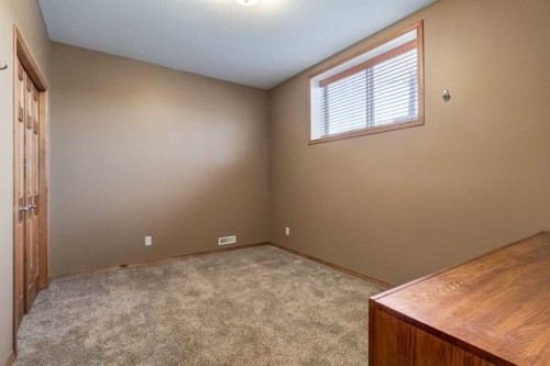 15 Barber Street Nw, Langdon, AB - Indoor Photo Showing Other Room