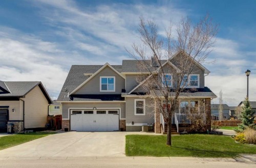 15 Barber Street Nw, Langdon, AB - Outdoor With Facade
