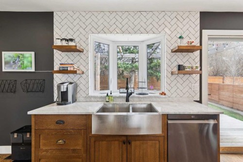 28 Calandar Road Nw, Calgary, AB - Indoor Photo Showing Kitchen With Double Sink