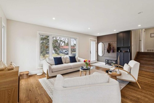 28 Calandar Road Nw, Calgary, AB - Indoor Photo Showing Living Room