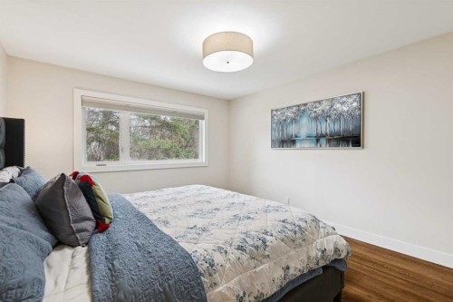 28 Calandar Road Nw, Calgary, AB - Indoor Photo Showing Bedroom