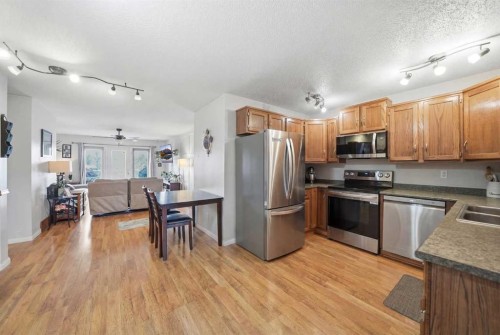 95 Summerwood Road, Airdrie, AB - Indoor Photo Showing Kitchen With Double Sink