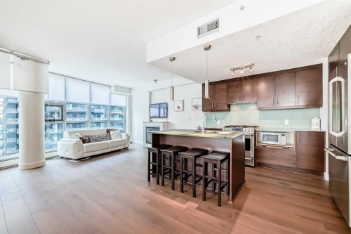 1002-735 2 Avenue Sw, Calgary, AB - Indoor Photo Showing Kitchen With Stainless Steel Kitchen