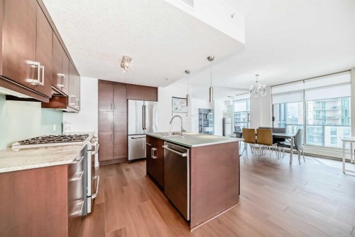 1002-735 2 Avenue Sw, Calgary, AB - Indoor Photo Showing Kitchen With Stainless Steel Kitchen With Upgraded Kitchen