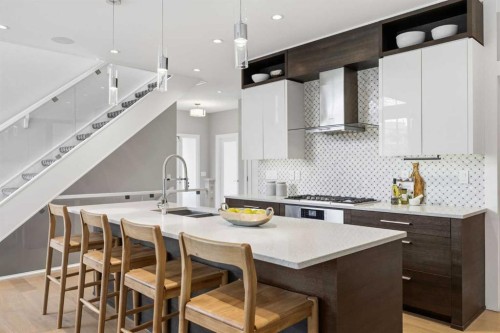 81 West Point Close Sw, Calgary, AB - Indoor Photo Showing Kitchen With Double Sink With Upgraded Kitchen